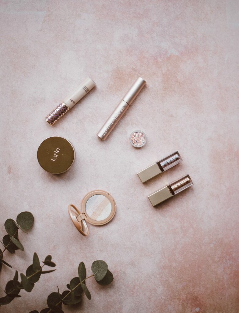 minimalist makeup on blush background