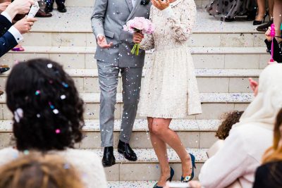 bride and groom walking down stairs